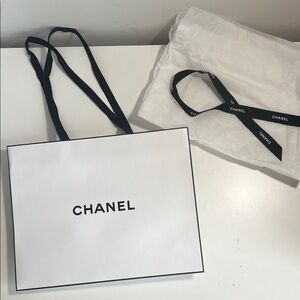 Chanel White Shopping Bag with Two Sheets of Tissue Paper and Black Ribbon